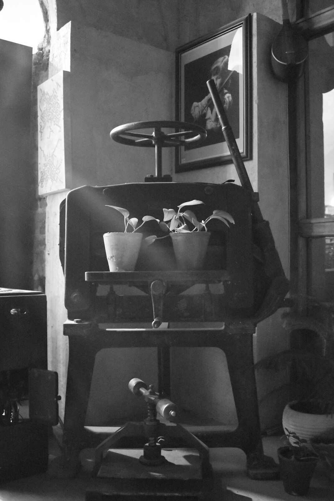 Black and white photograph of an early television studio with large bulky cameras