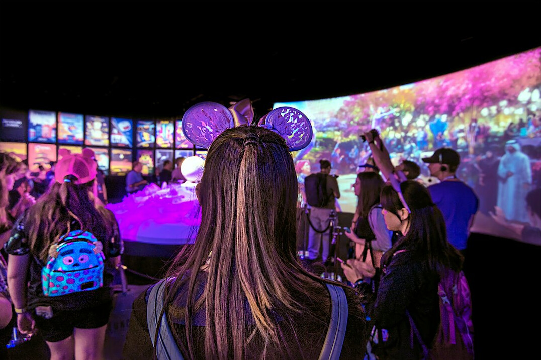 Immersive virtual production volume with curved LED wall and tracking markers